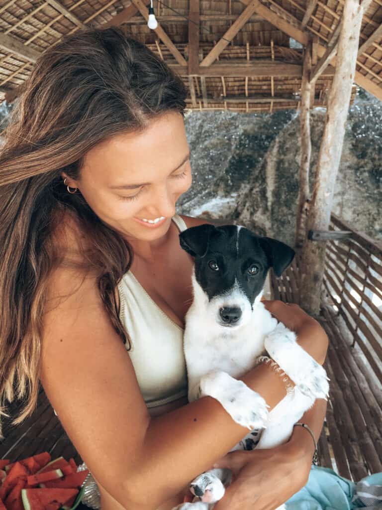 Coron Banul Beach Woman holding Dog