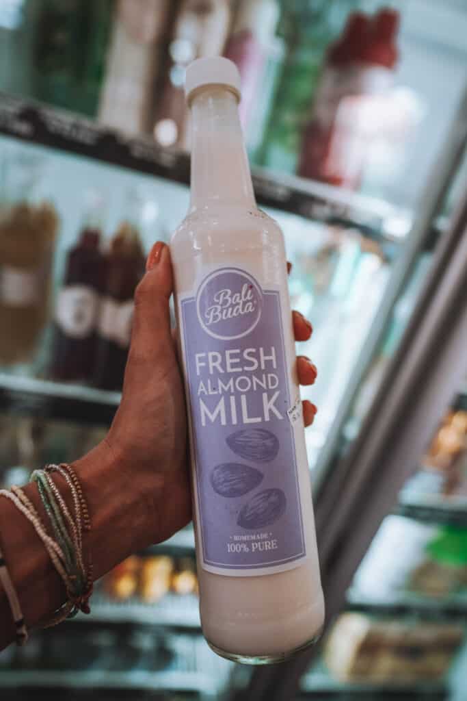 bottle of almond milk at bali buda canggu