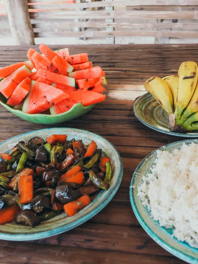 Food plates on table at Banul Beach Philippines