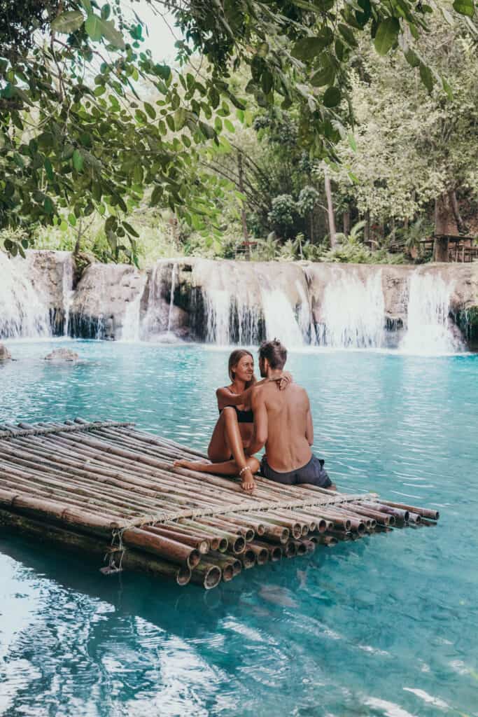 Couple on raft at Cambugahay Falls Siquijor