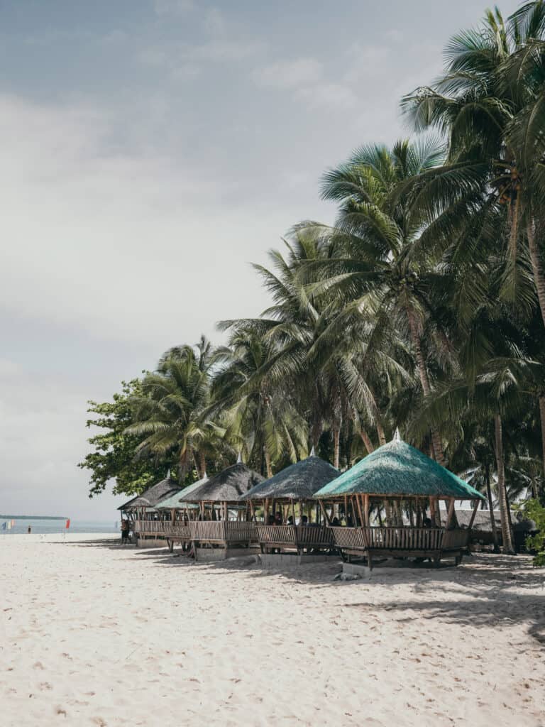 Beach huts on Daku Island Beach Siargao