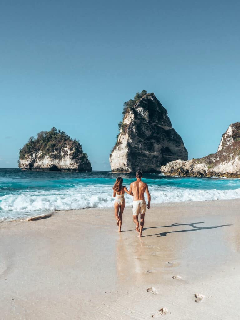 Couuple Running on Diamond Beach Nusa Penida