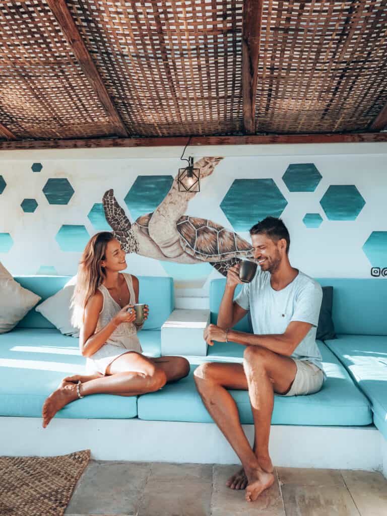 Couple drinking coffee at Serenity Beachfront Villa Gili Air