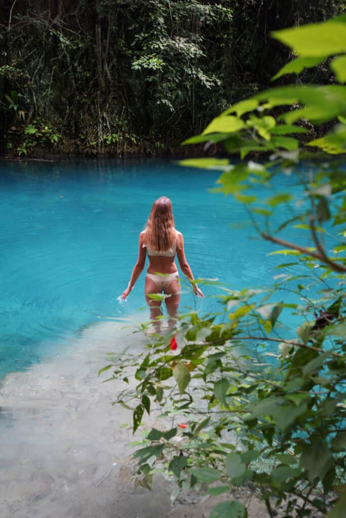 Women standing in Water at Kawasan Falls Cebu Philippines