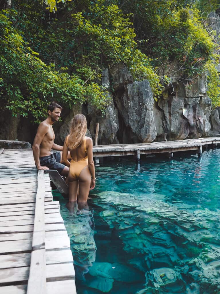 Couple at Kayangan Lake Island Hopping Coron Philippines