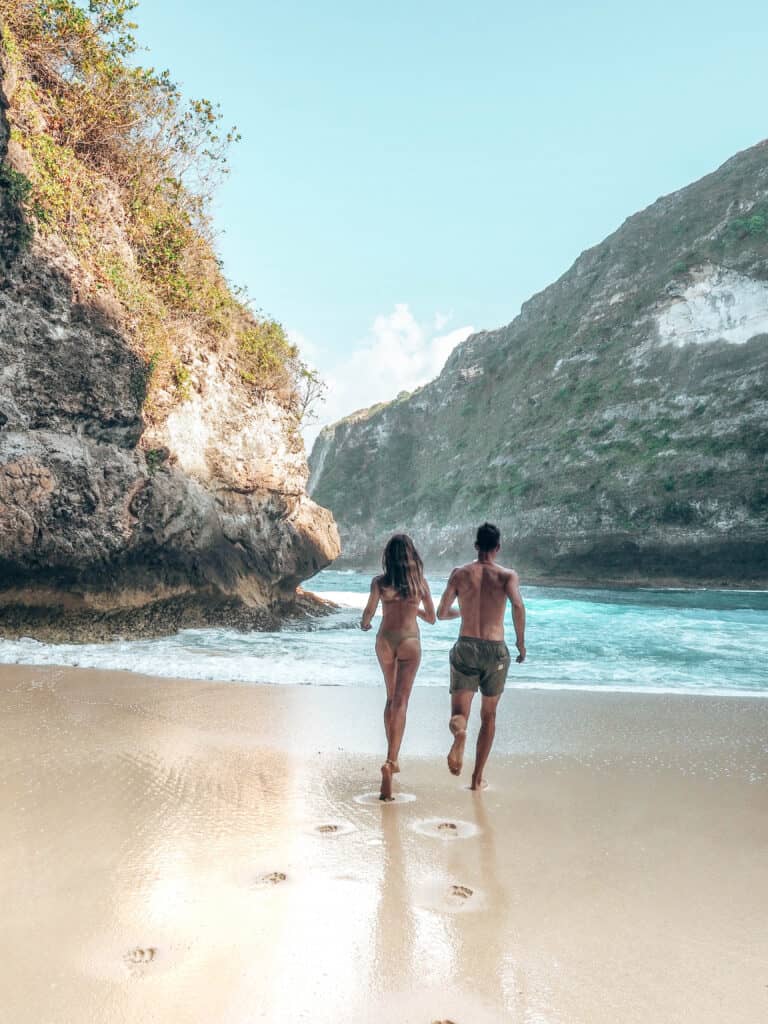 Couple running on Kelinking Beach Nusa Penida