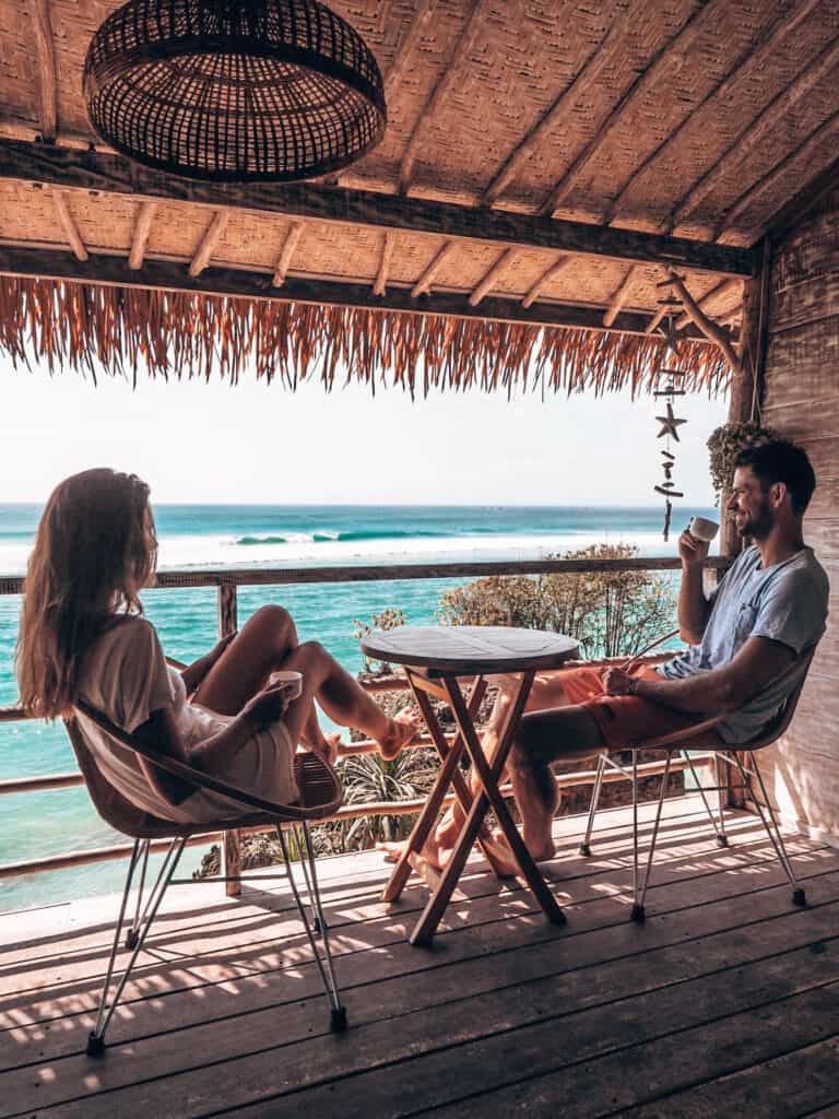 Couple Chilling on balcony at Le Cliff Uluwatu Bali