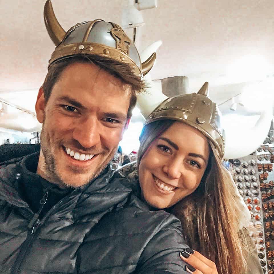 Two people with viking helmets in souvenir shop Iceland