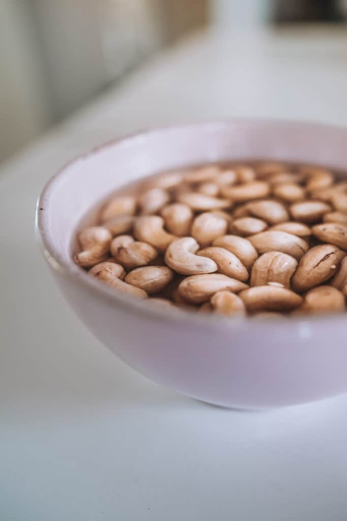 Cup with soaking cashew nuts