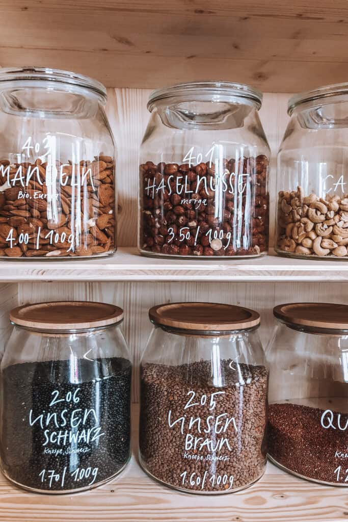 Jars of glas filled with nuts and seeds