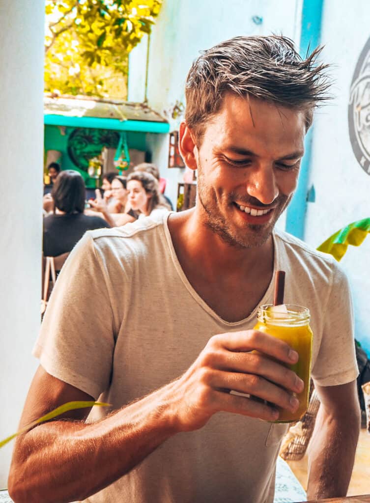 Man drinking juice in a restaurant