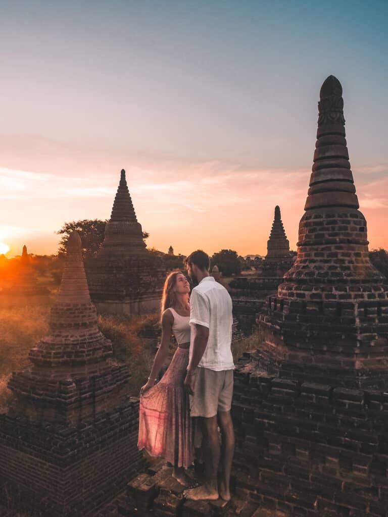 Couple on small Pagoda Bagan Sunset