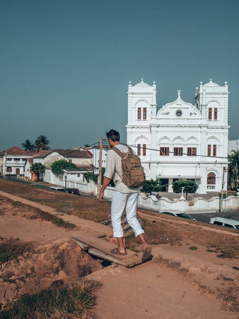 Galle Fort Man walking on wall