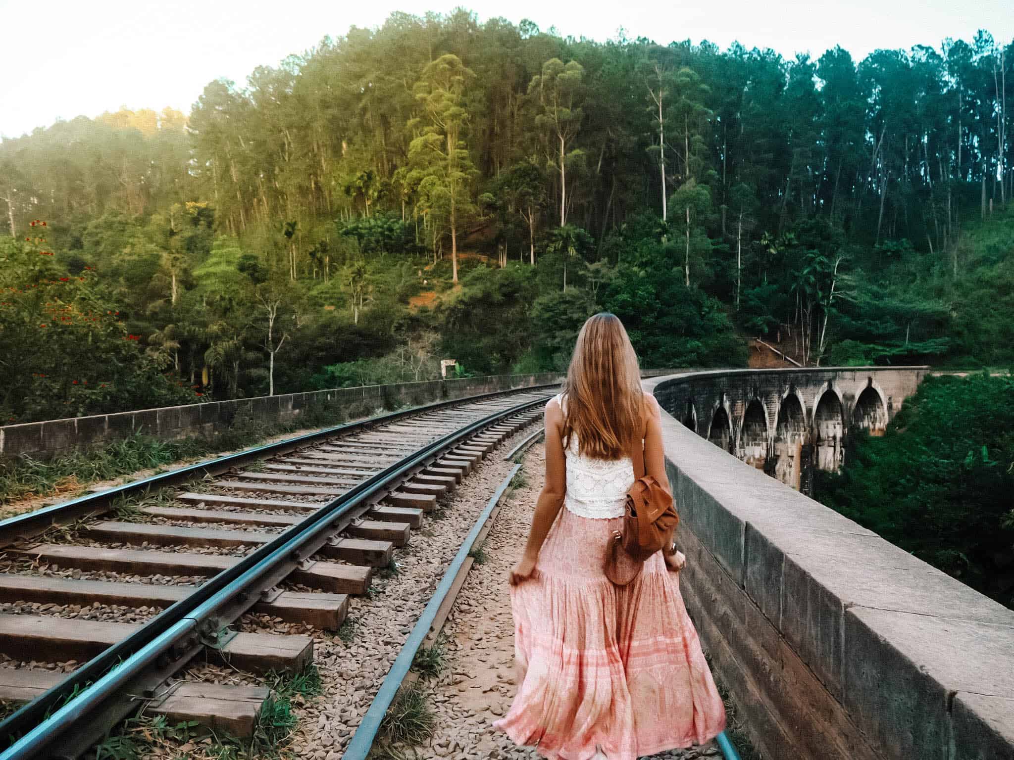 Women walking on nine arches bridge Ella