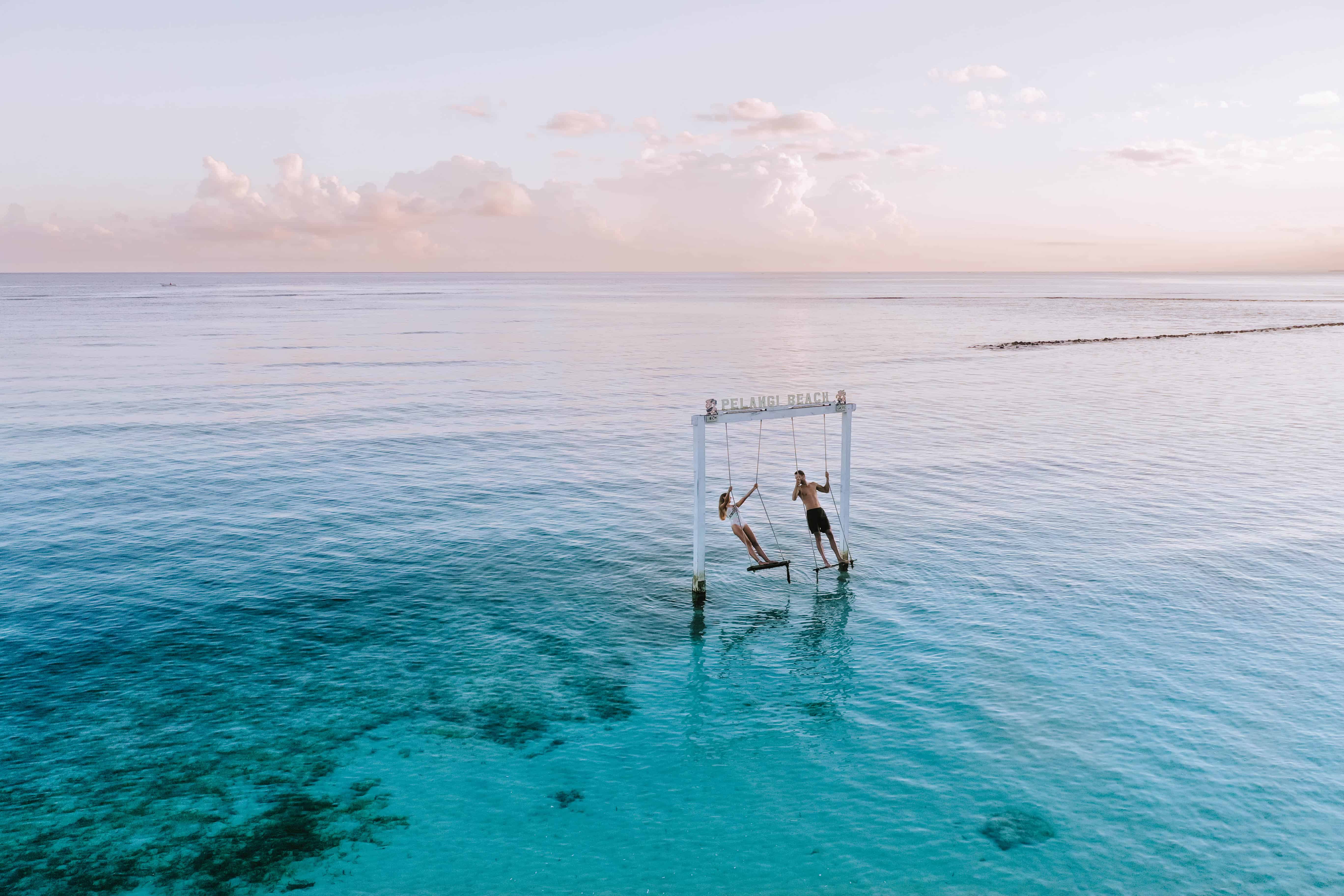 Gili Air Pelangi Beach Swing Couple Sunrise