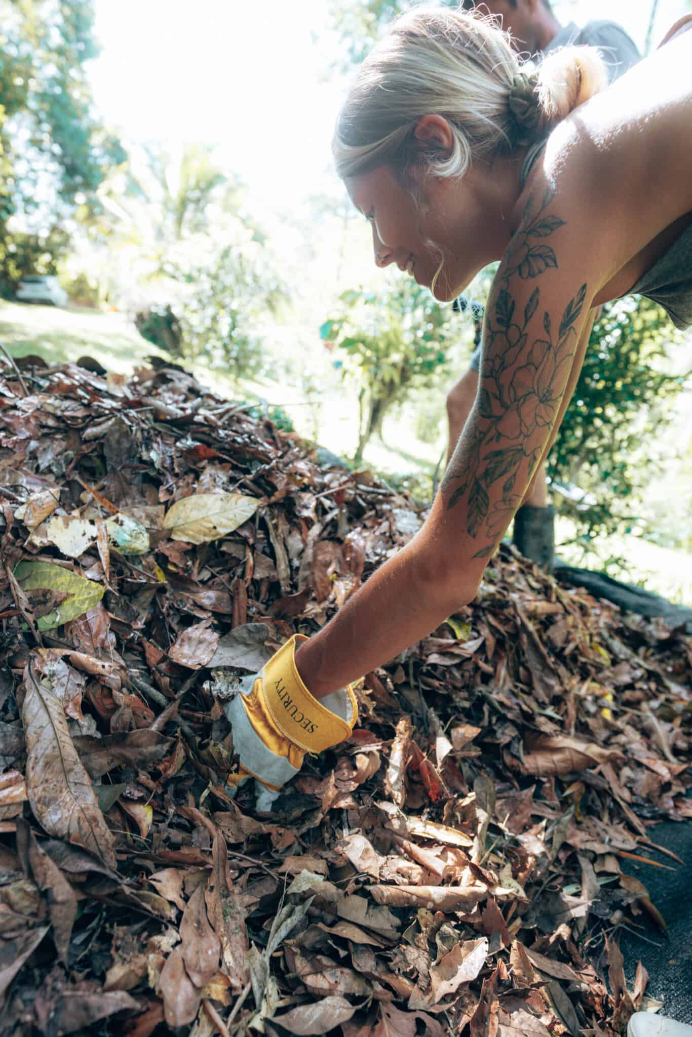 Finca Tierra Permaculture Design Course field work making compost leaves