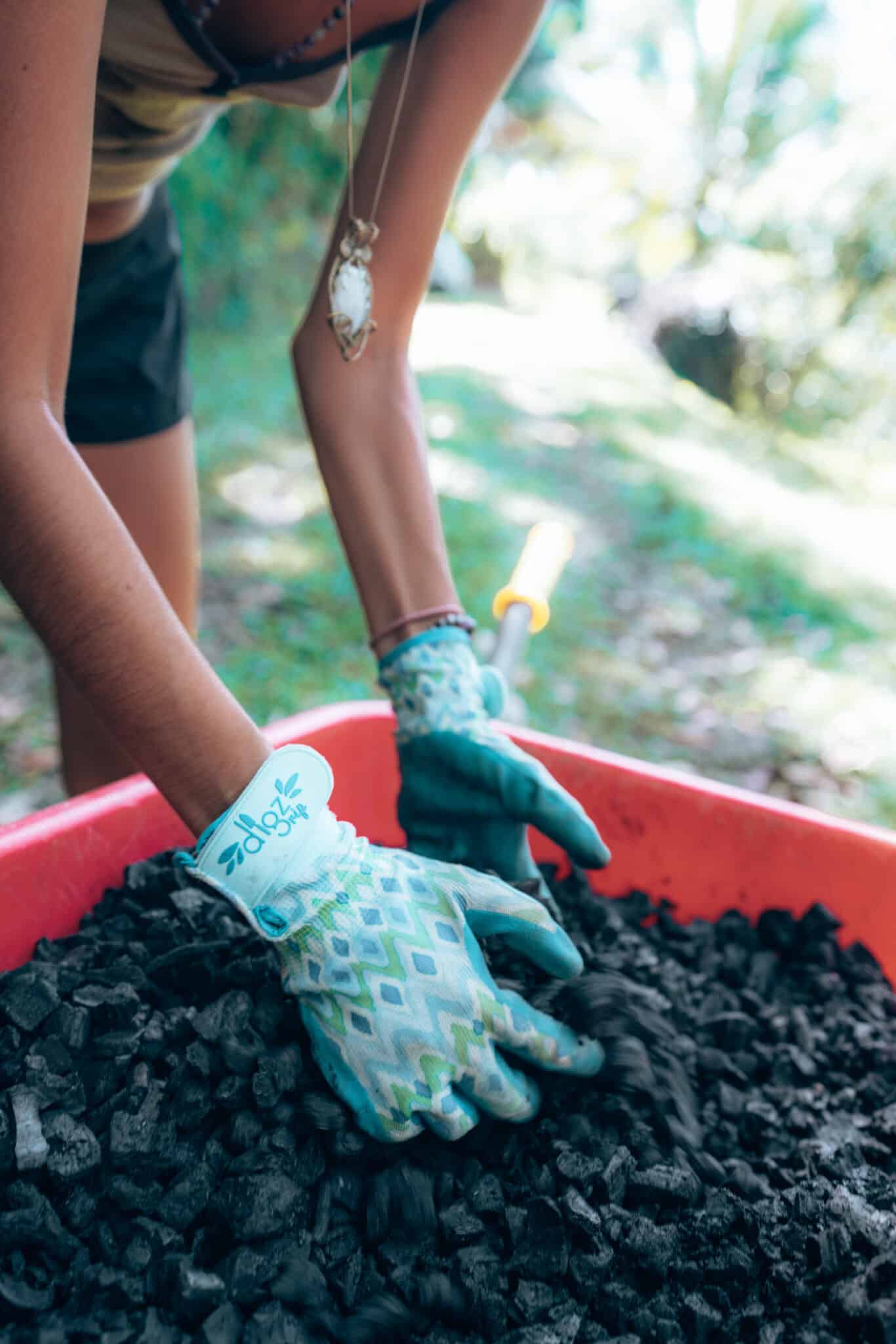 Finca Tierra Permaculture Design Course field work making compost charcoal