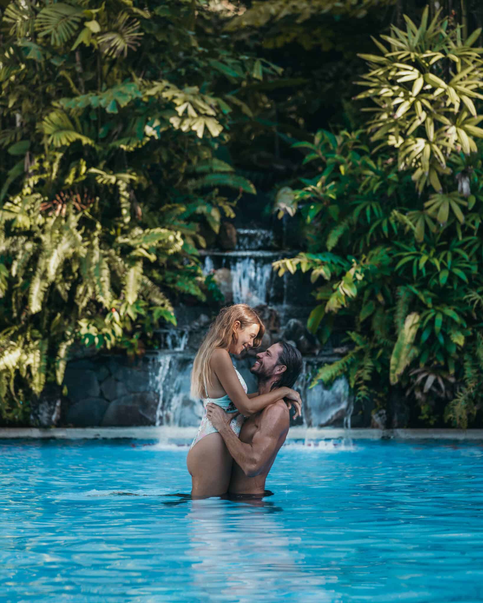A couple embracing in a swimming pool in Tortuguero, Costa Rica.