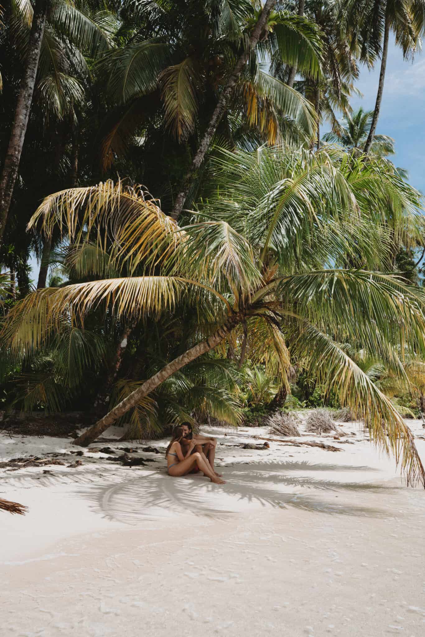 Zapatilla Island Bocas del Toro Couple Beach palm tree