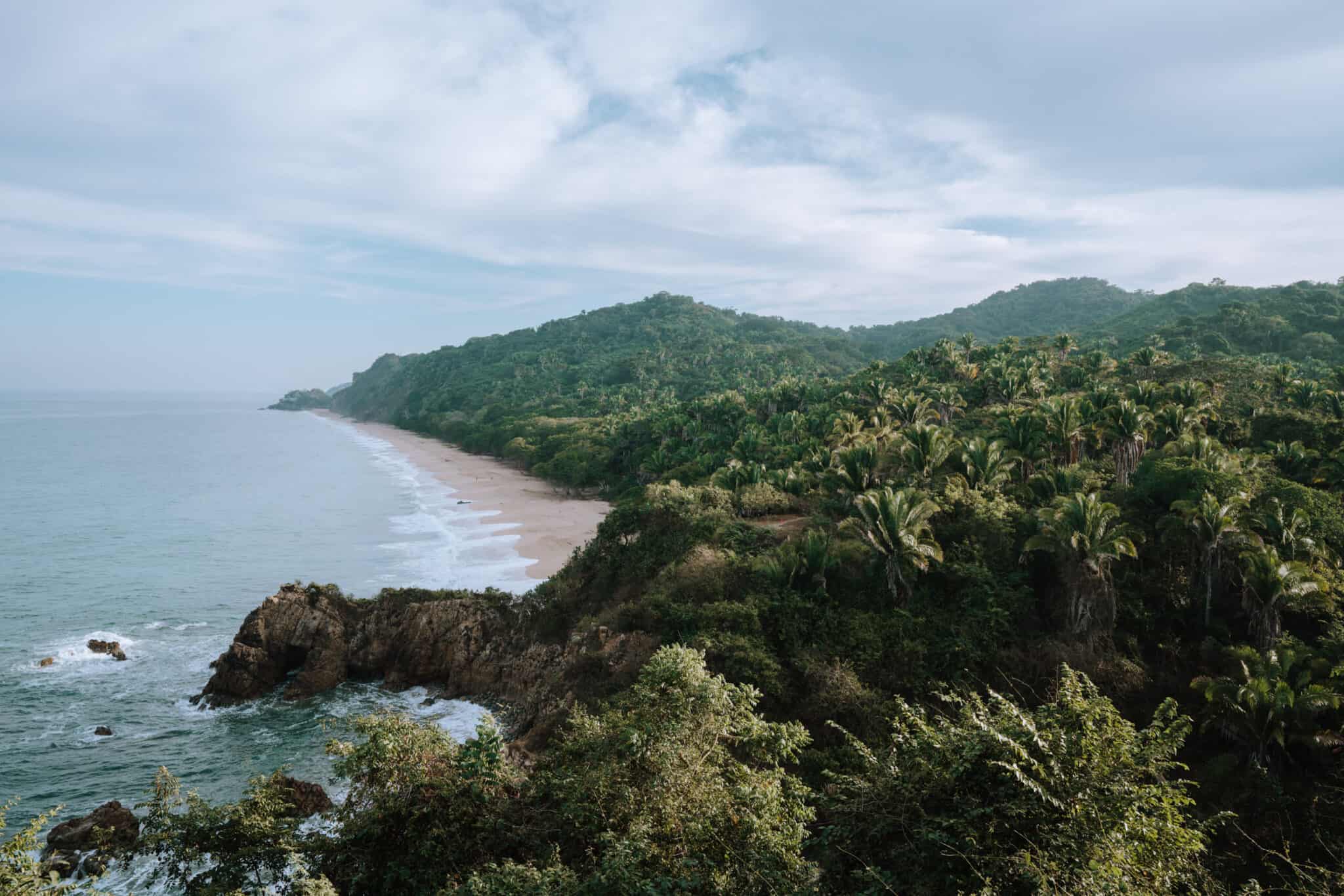 An aerial view of a tropical beach in Sayulita, Costa Rica.