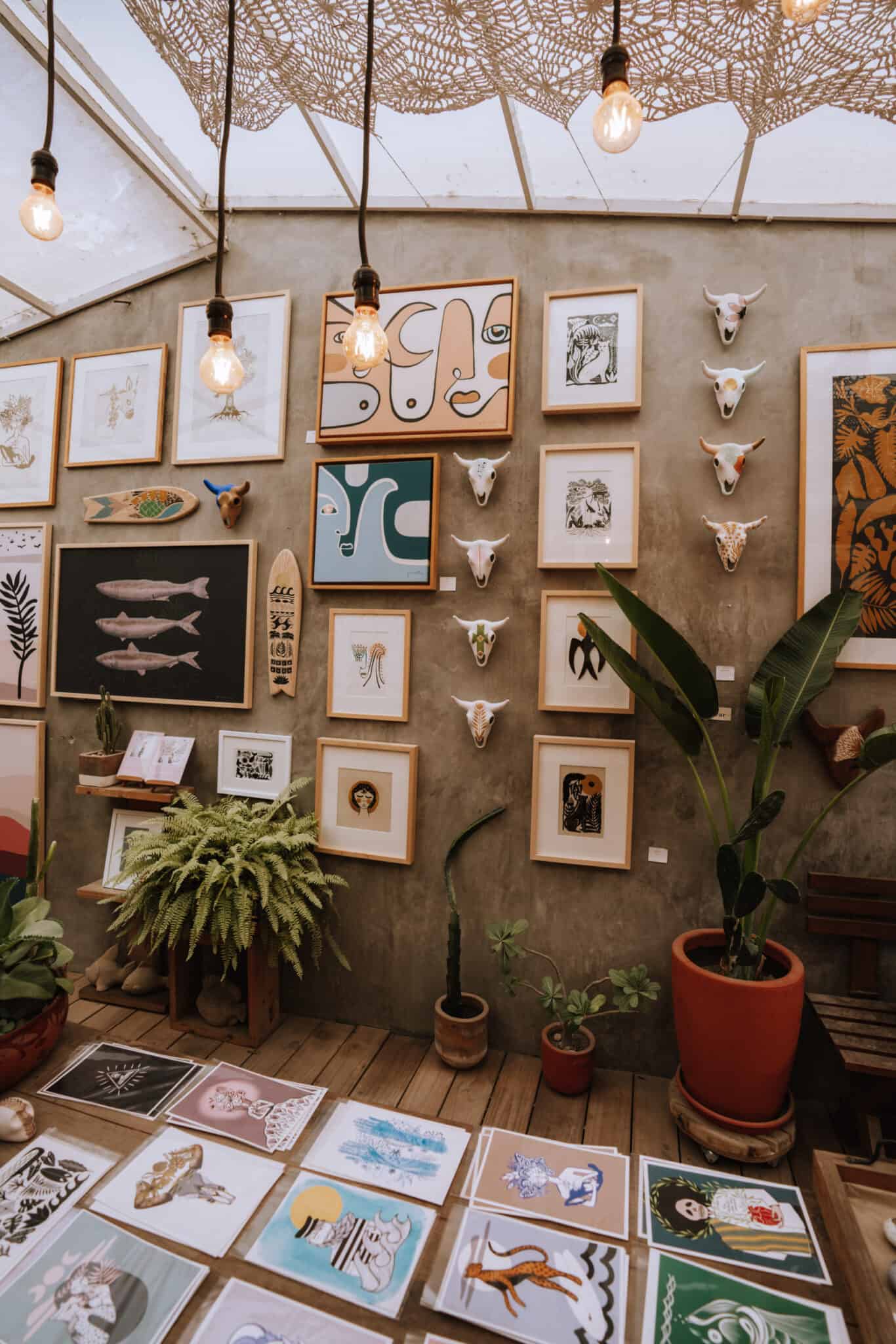 A Sayulita-themed room with a lot of art on the wall.