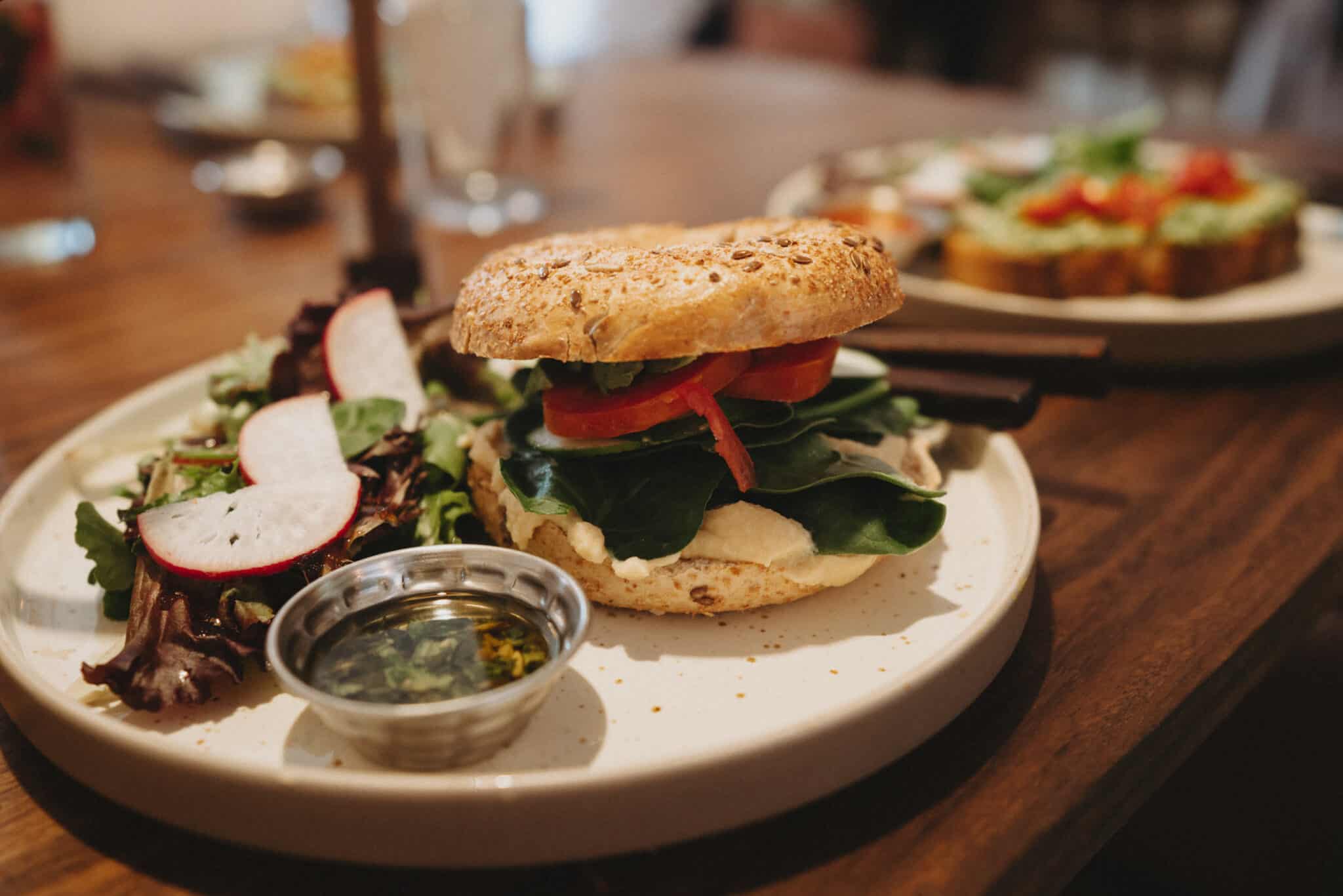 A plate with a Sayulita-inspired sandwich and salad.