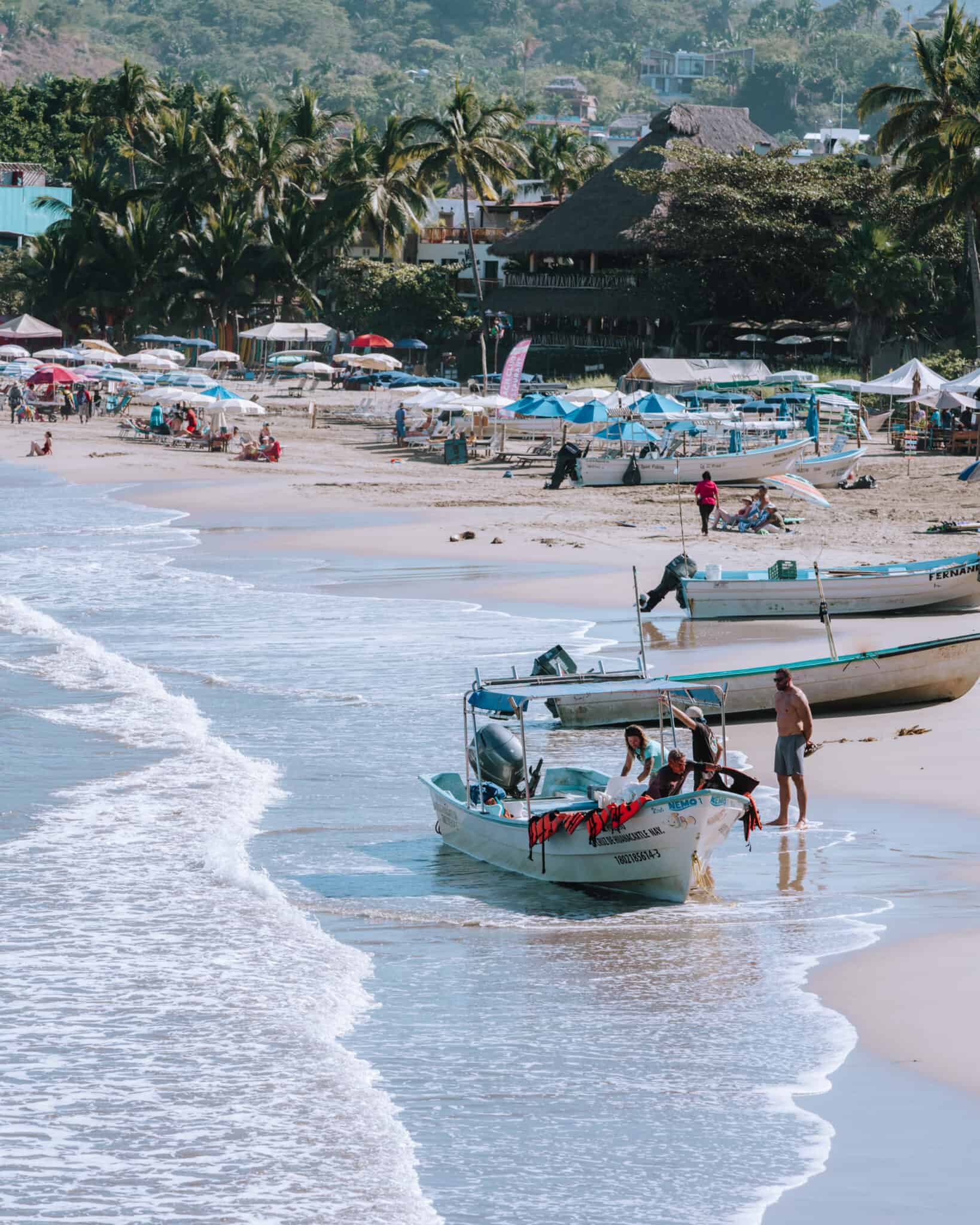 A Sayulita beach with numerous boats.