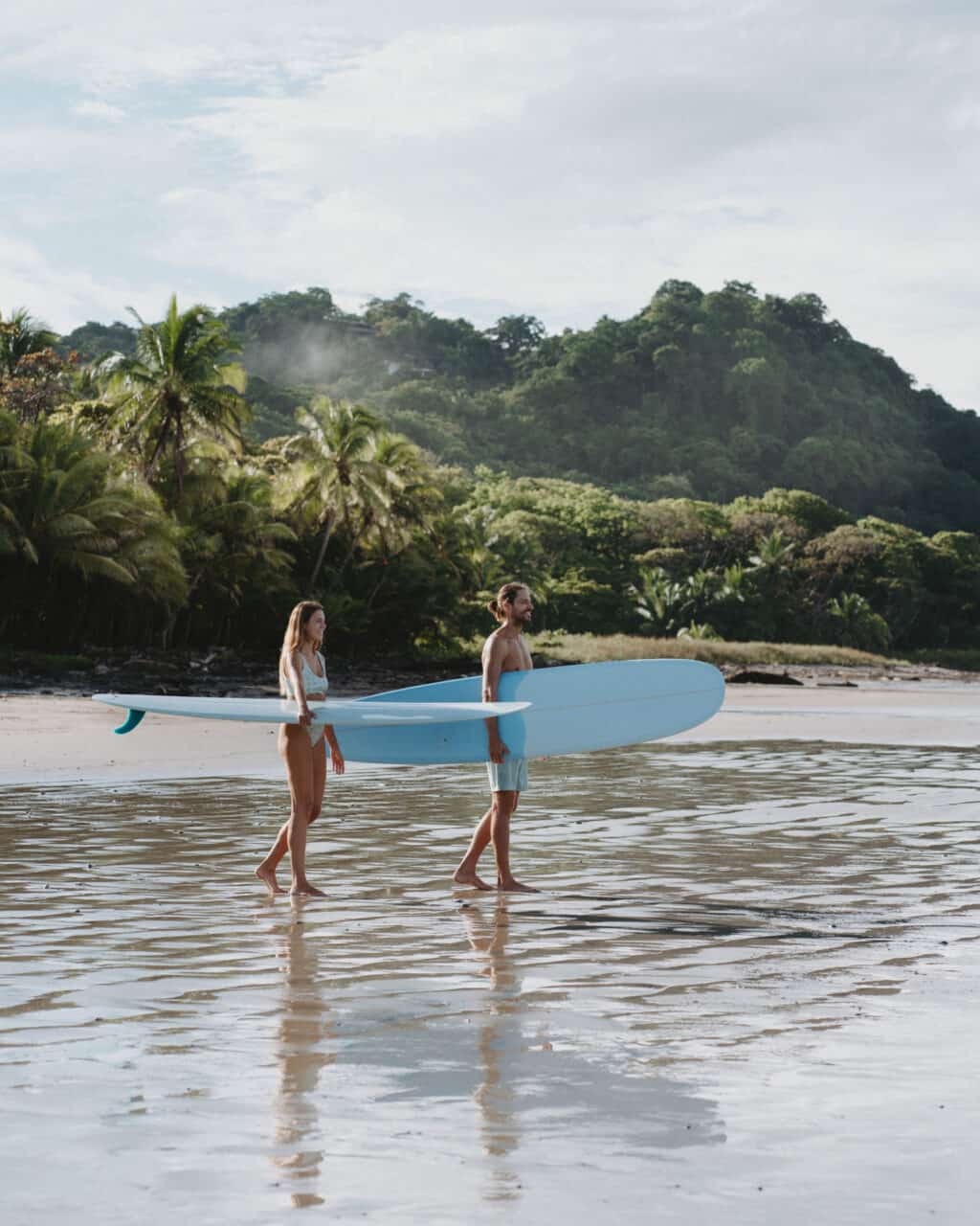 Couple Surfing Costa Rica