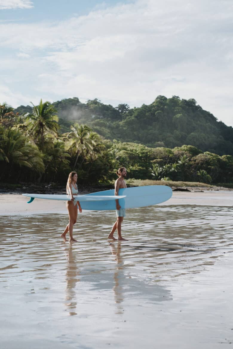 Couple Surfing Costa Rica