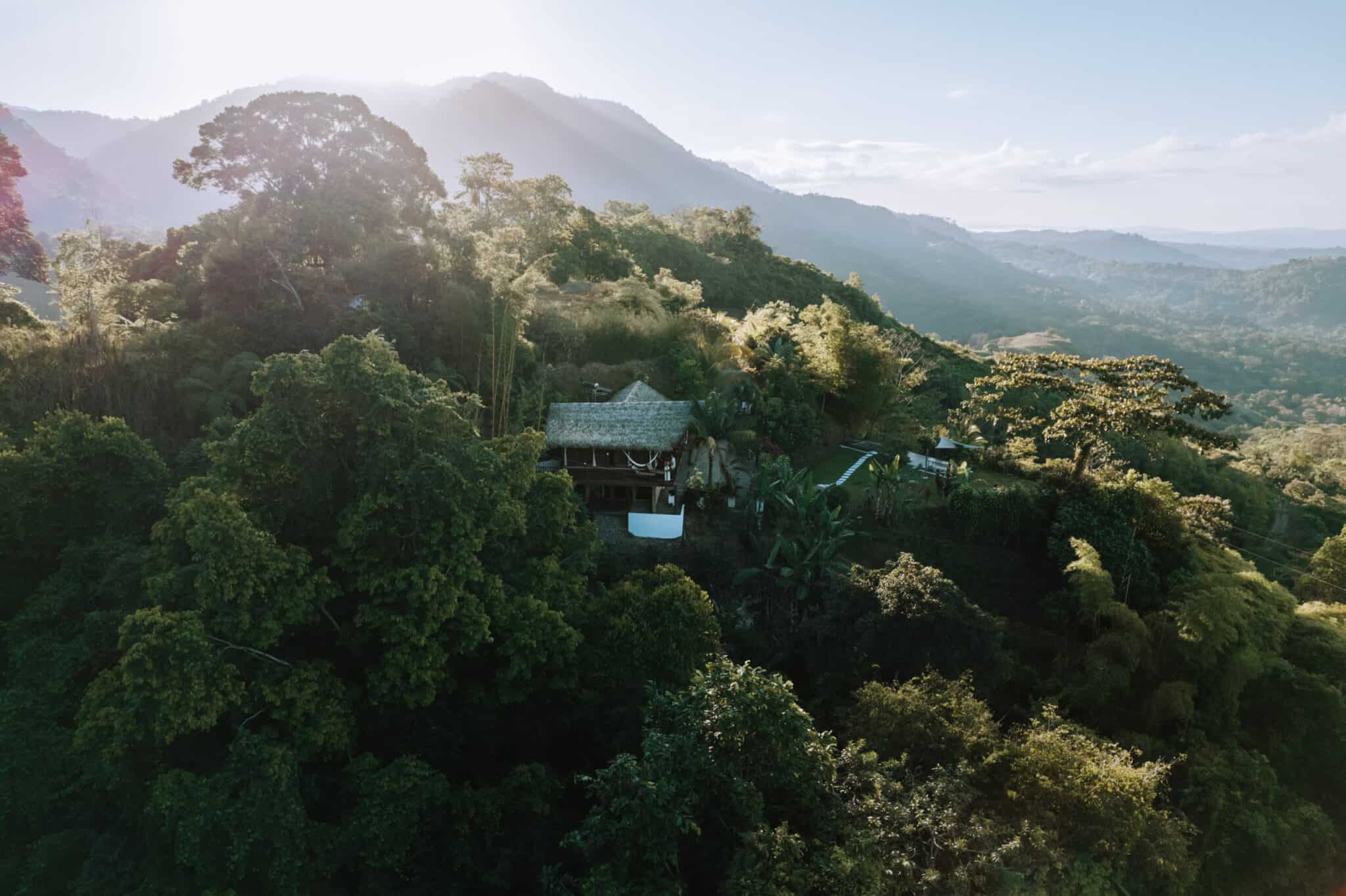 Work with us to capture an aerial view of a house in the jungle.