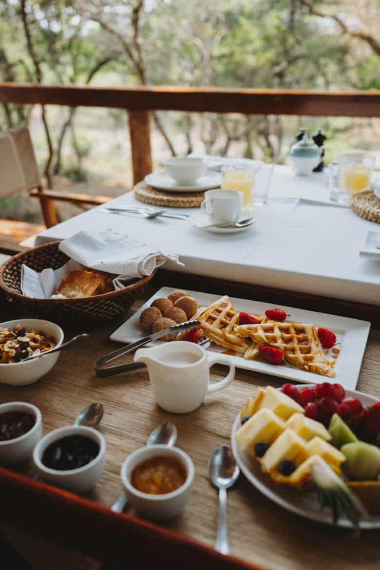 A table with a lot of food on it at Rhino Sands in South Africa.